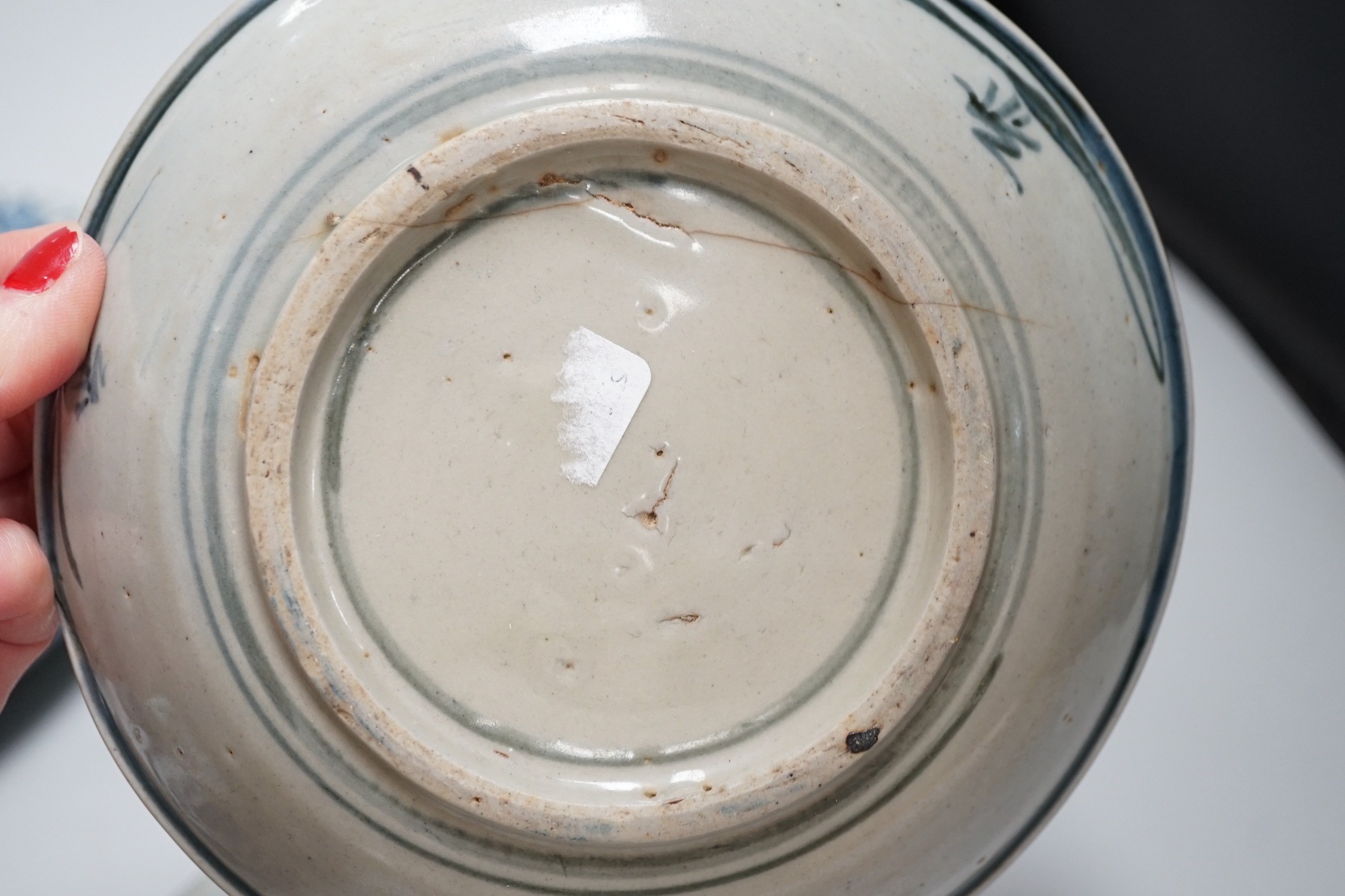 A Chinese blue and white bowl, tea bowl and saucer, and two other dishes, largest 29cm diameter